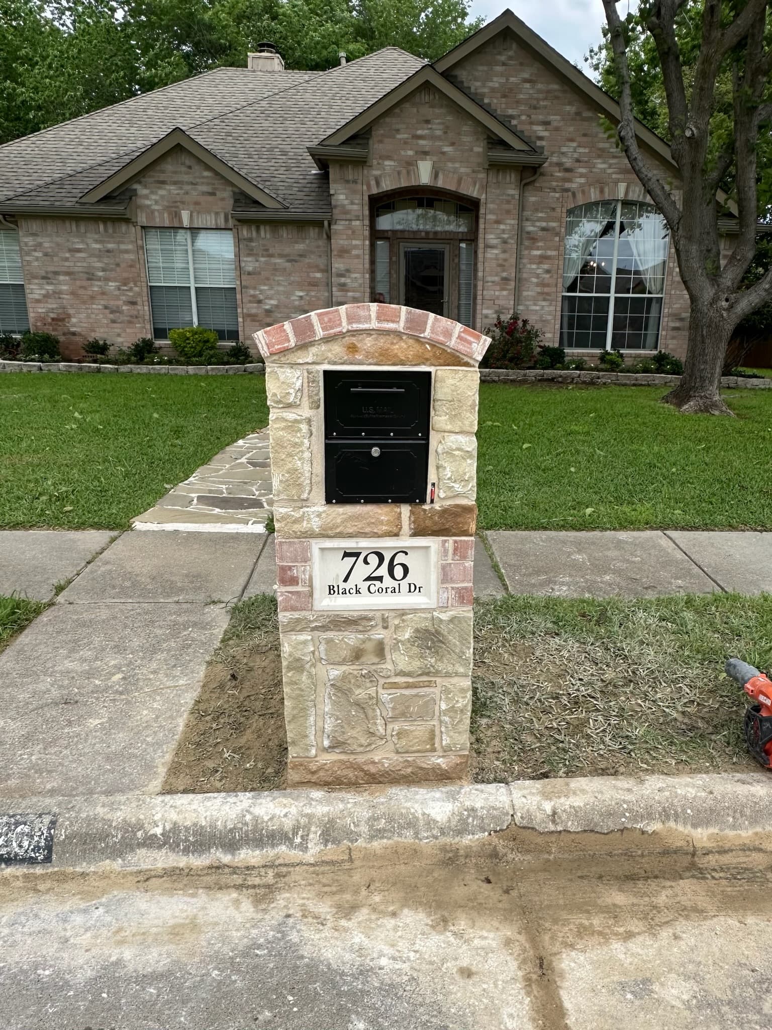 Custom brick mailbox replacement enhancing curb appeal for a home in McKinney, TX